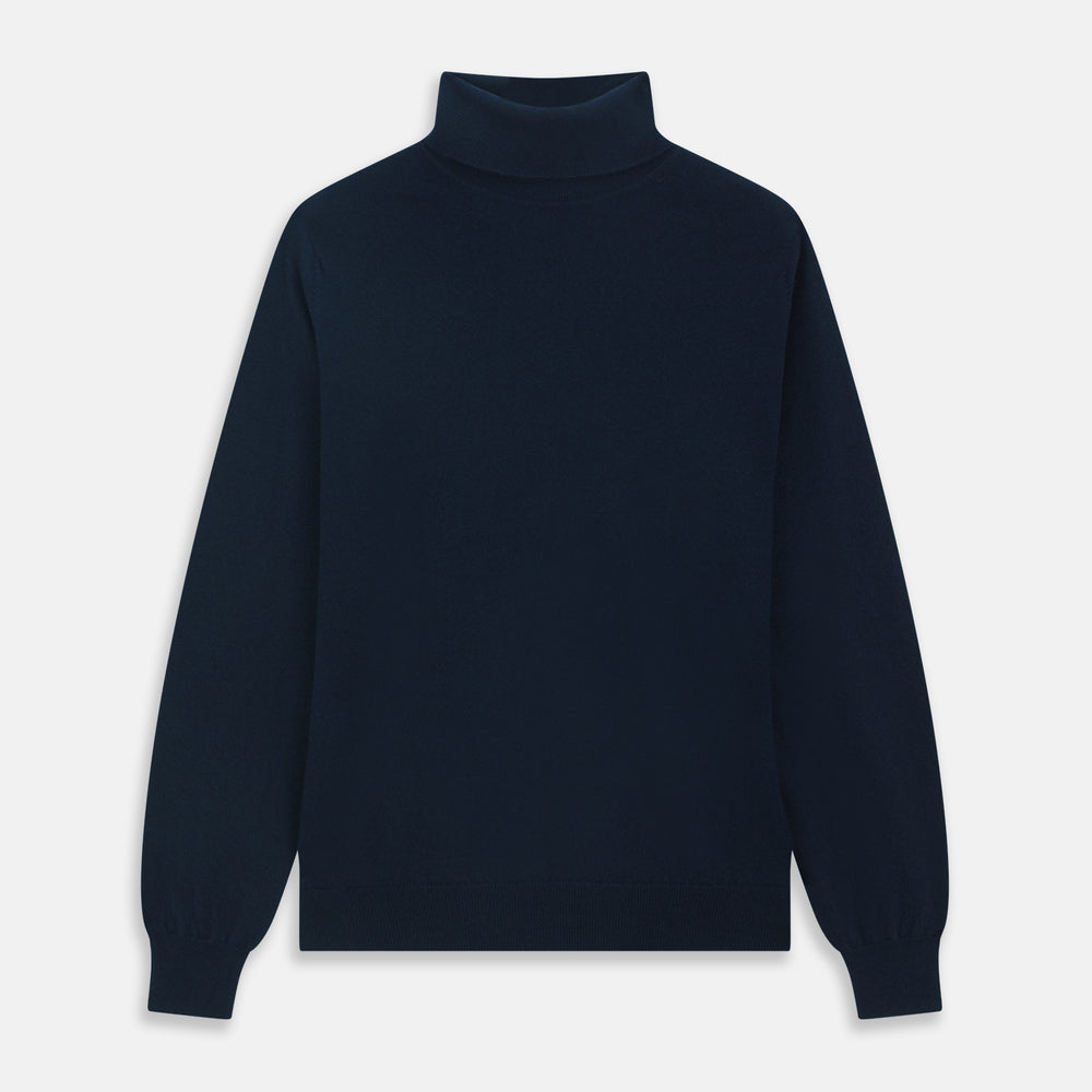 The Turnbull & Asser Navy Cashmere Roll Neck Jumper, with ribbed cuffs and hem, is a timeless autumn essential. Shown laid flat on a white background, this plain long-sleeved sweater offers classic style and comfort.