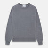 View 1 of product The Turnbull & Asser Grey Crew Neck Merino Wool Jumper, a timeless long-sleeved staple, is shown laid flat on a white background.