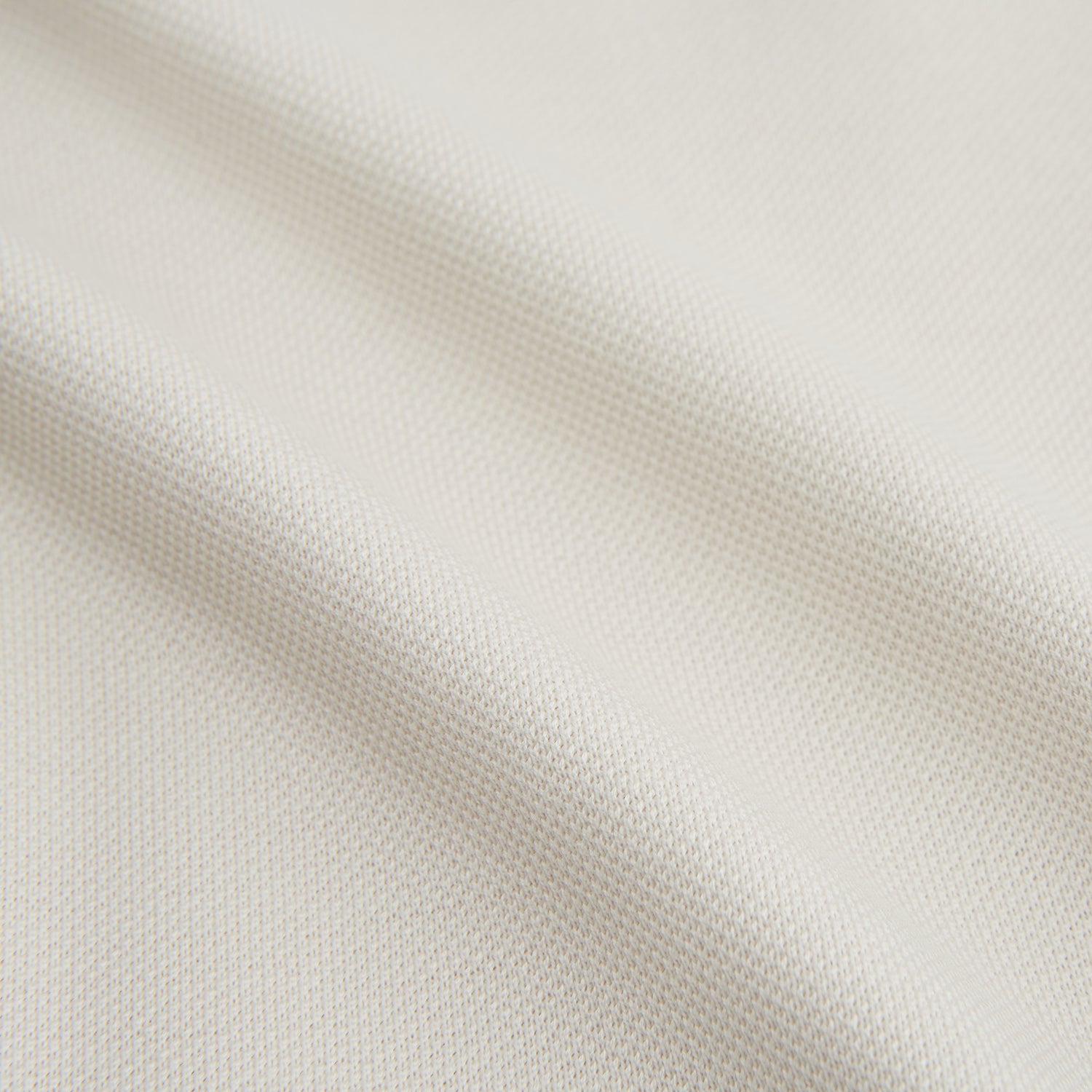 View 6 of product The Turnbull & Asser White Pique Shirt is a long-sleeve, white button-up with a chest pocket and beige buttons, laid flat on a white background, featuring an elevated silhouette inspired by elegant polos.