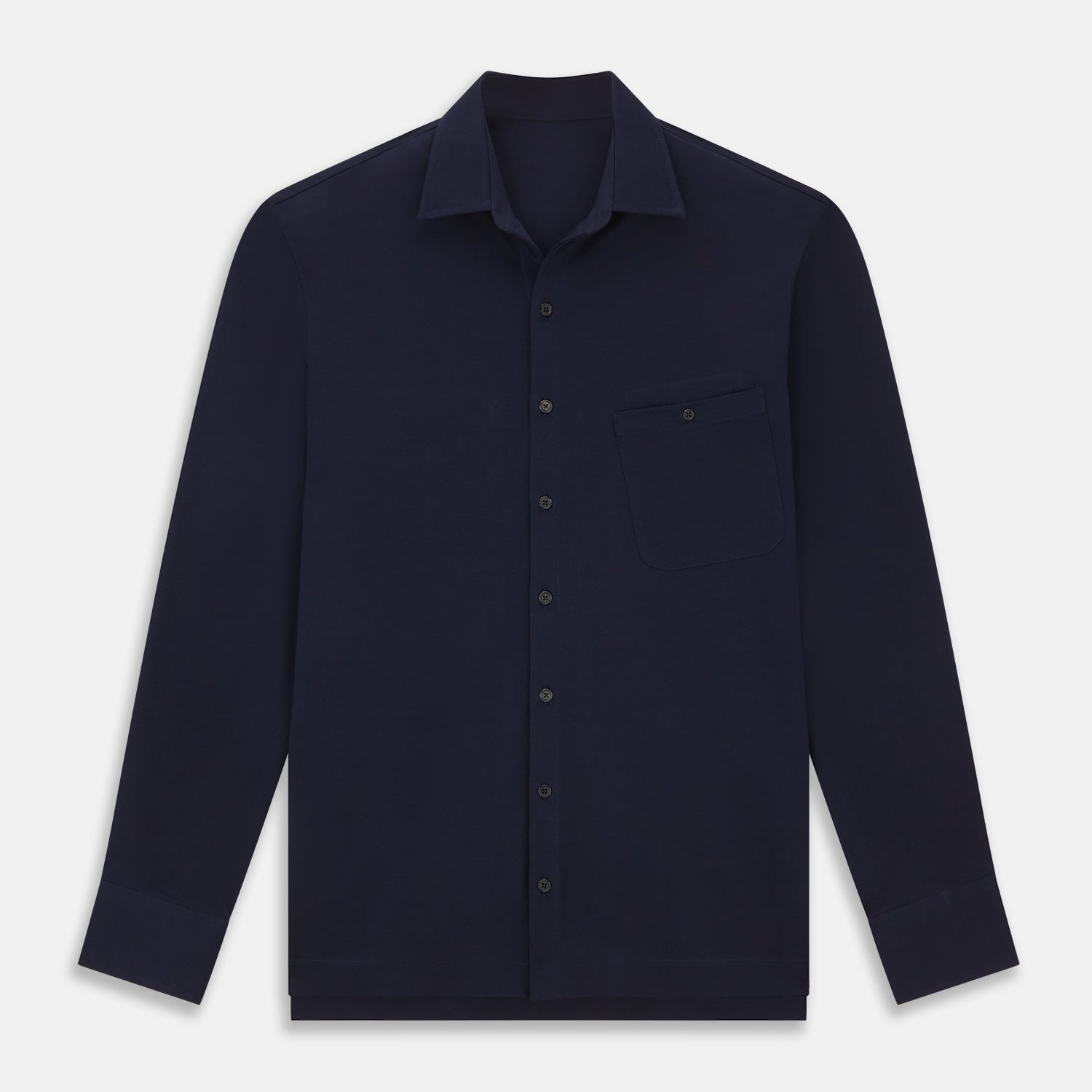 View 1 of product The Turnbull & Asser Navy Pique Shirt is a long-sleeved, dark navy button-up with a left chest pocket, classic collar, and buttoned cuffs, shown laid flat on a white background.