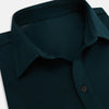 View 2 of product The Turnbull & Asser Dark Green Pique Shirt features long sleeves, a button-up front, chest pocket, and an elevated silhouette, displayed flat on a white background.