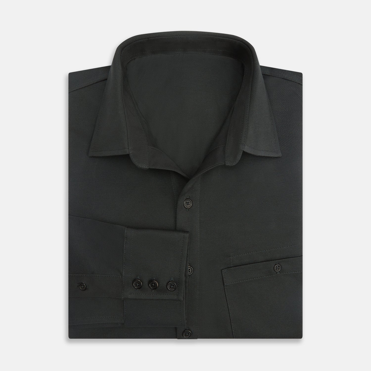 View 5 of product The Moss Green Pique Shirt by Turnbull & Asser, featuring long sleeves, a button-up front, collar, and single chest pocket, is laid flat on a white background for a refined take on classic style.