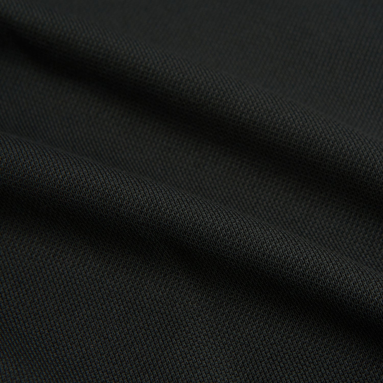 View 6 of product The Moss Green Pique Shirt by Turnbull & Asser, featuring long sleeves, a button-up front, collar, and single chest pocket, is laid flat on a white background for a refined take on classic style.