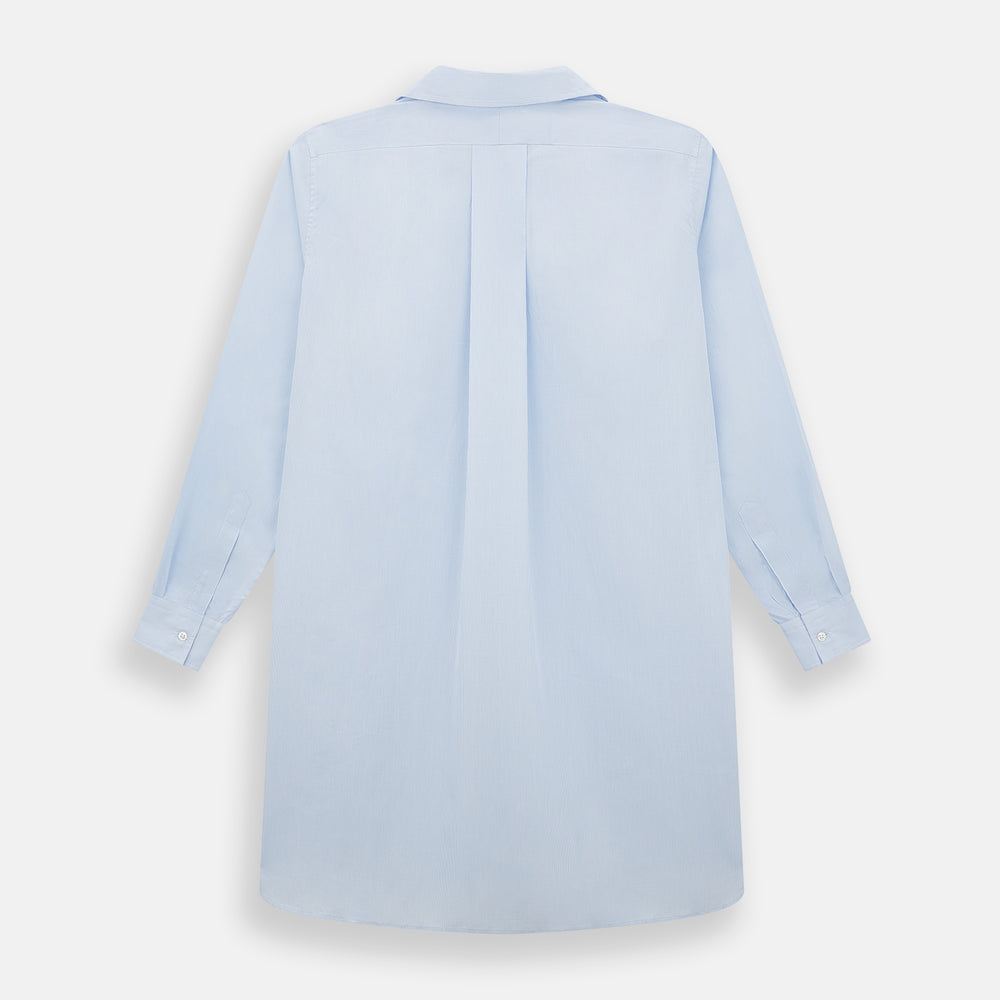 The Turnbull & Asser Pale Blue Fine Micro Check Nightshirt is a relaxed-fit, long-sleeve sleepwear piece with a collar, chest pocket, buttoned half-placket, and front pleat, shown against a plain white background.