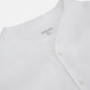 View 2 of product The Turnbull & Asser White Linen Nightshirt features long sleeves, a buttoned placket, single chest pocket, and relaxed fit—perfect for stylish sleepwear. Shown laid flat on a white background.