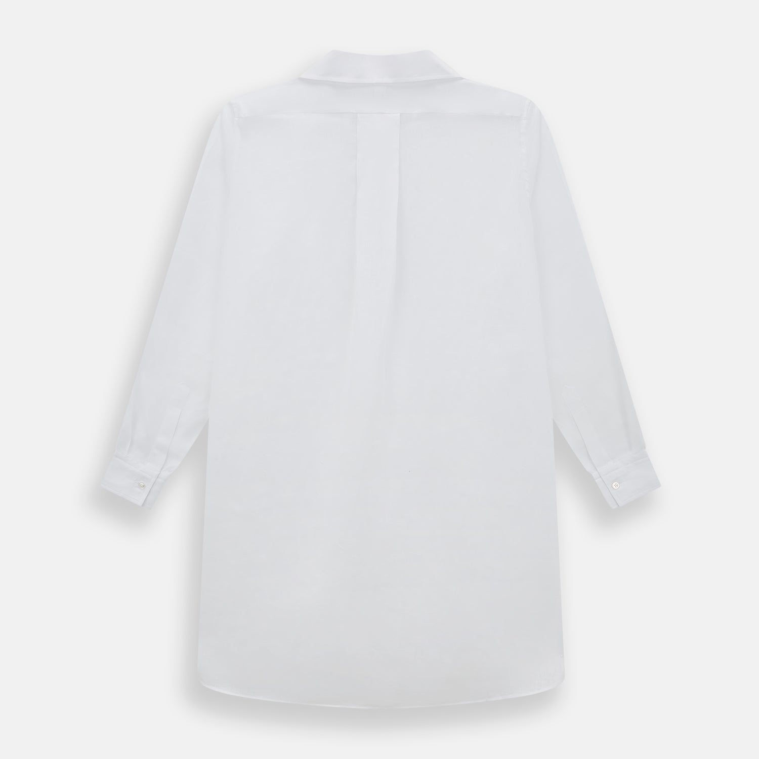 View 3 of product The Turnbull & Asser White Linen Nightshirt features long sleeves, a buttoned placket, single chest pocket, and relaxed fit—perfect for stylish sleepwear. Shown laid flat on a white background.