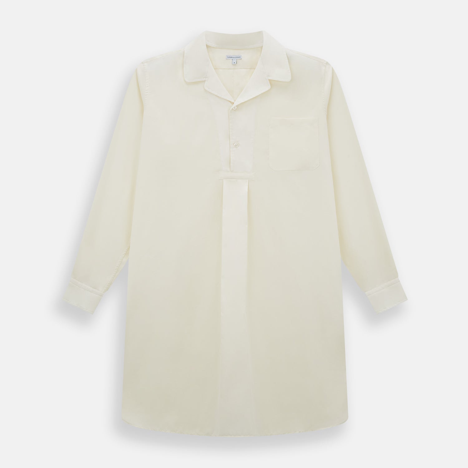 View 1 of product The Cream Nightshirt by Turnbull & Asser is a long-sleeved, cream-colored shirt dress with a collar, partial button front, chest pocket, and relaxed fit—ideal as comfortable sleepwear—shown on a plain white background.