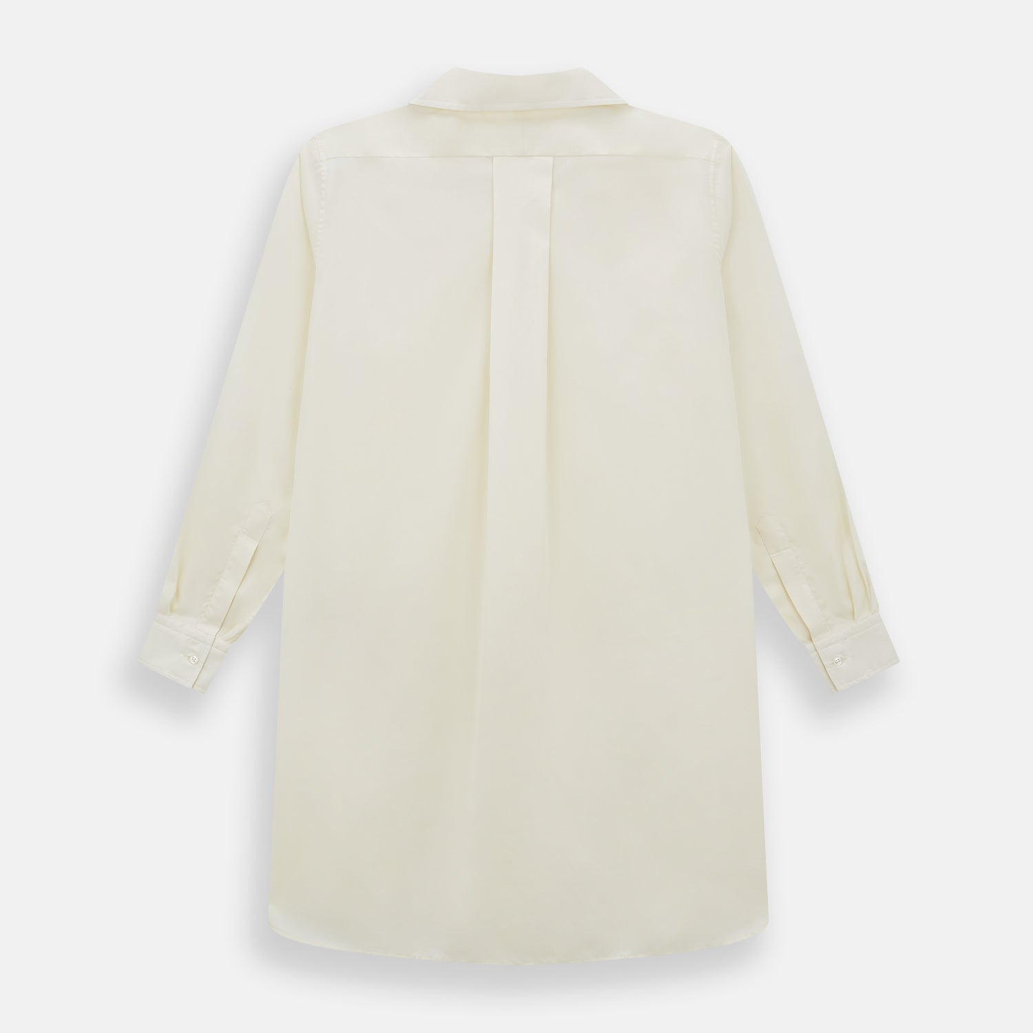 View 3 of product The Cream Nightshirt by Turnbull & Asser is a long-sleeved, cream-colored shirt dress with a collar, partial button front, chest pocket, and relaxed fit—ideal as comfortable sleepwear—shown on a plain white background.