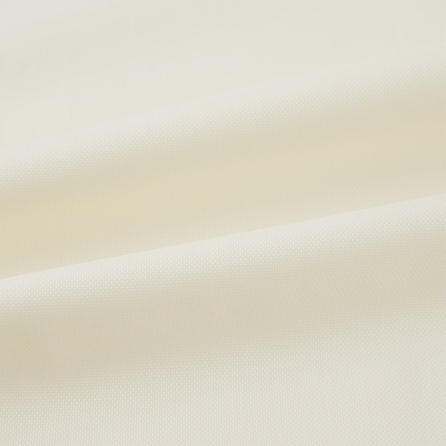 View 5 of product The Cream Nightshirt by Turnbull & Asser is a long-sleeved, cream-colored shirt dress with a collar, partial button front, chest pocket, and relaxed fit—ideal as comfortable sleepwear—shown on a plain white background.