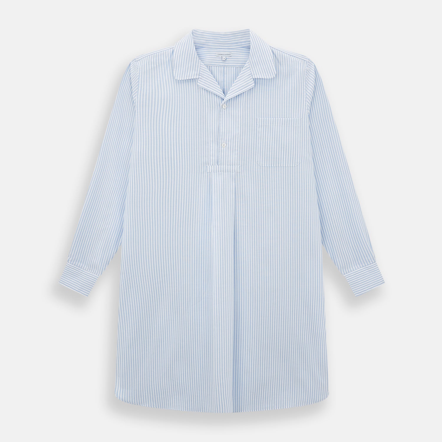 View 1 of product The Turnbull & Asser Pale Blue Bengal Stripe Nightshirt features light blue and white vertical stripes, a collar, chest pocket, and upper front buttons—perfect relaxing sleepwear, shown on a white background.