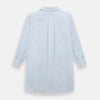 View 3 of product The Turnbull & Asser Pale Blue Bengal Stripe Nightshirt features light blue and white vertical stripes, a collar, chest pocket, and upper front buttons—perfect relaxing sleepwear, shown on a white background.
