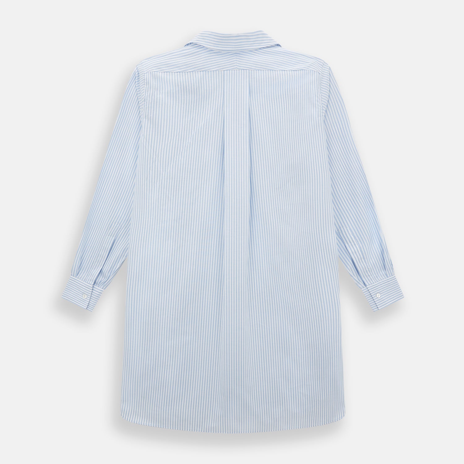 View 3 of product The Turnbull & Asser Pale Blue Bengal Stripe Nightshirt features light blue and white vertical stripes, a collar, chest pocket, and upper front buttons—perfect relaxing sleepwear, shown on a white background.