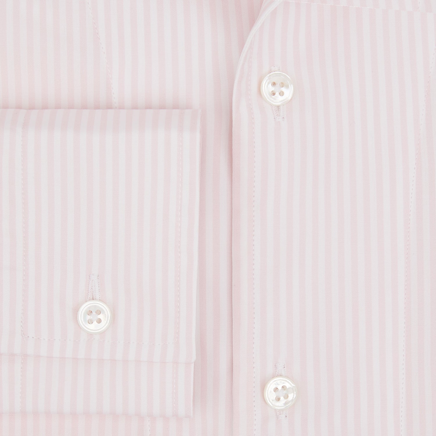 View 4 of product The Turnbull & Asser Pale Pink Bengal Stripe Nightshirt features long sleeves, a subtle striped pattern, a collar, chest pocket, and front buttons. Shown flat on a white background, this stylish sleepwear offers comfort and elegance.