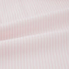 View 5 of product The Turnbull & Asser Pale Pink Bengal Stripe Nightshirt features long sleeves, a subtle striped pattern, a collar, chest pocket, and front buttons. Shown flat on a white background, this stylish sleepwear offers comfort and elegance.