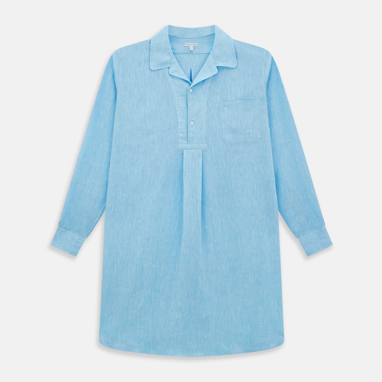 View 1 of product The Turnbull & Asser Turquoise Linen Nightshirt features long sleeves, a collar, button placket, single chest pocket, and a loose fit. Shown in light blue on a plain white background.