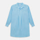 The Turnbull & Asser Turquoise Linen Nightshirt features long sleeves, a collar, button placket, single chest pocket, and a loose fit. Shown in light blue on a plain white background.