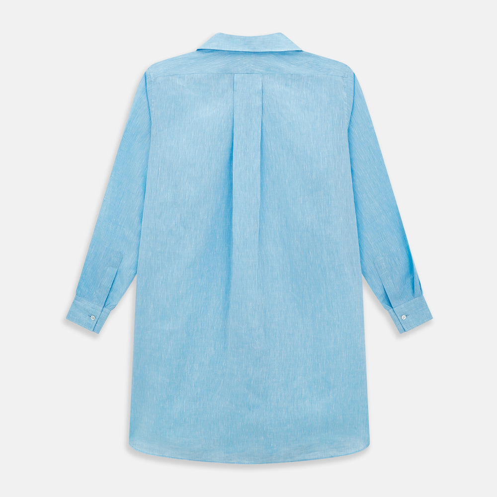 The Turnbull & Asser Turquoise Linen Nightshirt features long sleeves, a collar, button placket, single chest pocket, and a loose fit. Shown in light blue on a plain white background.