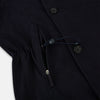 View 5 of product The Navy Short Albert Trench Coat by Turnbull & Asser UK features dark navy fabric, six black buttons, a notched collar, long sleeves with adjustable cuffs, and front zip pockets—displayed on a plain white background.