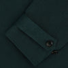 View 4 of product Turnbull & Asser UK's Forest Green Short Albert Trench Coat features a double-breasted design, black buttons, front chest pocket, two zippered side pockets, and strapped cuffs, shown against a plain white background.
