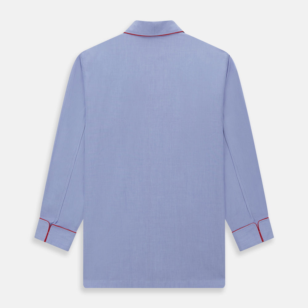 The Blue Piped End-on-End Cotton Pyjama Set by Turnbull & Asser features light blue long sleeves, red piping, front buttons, chest pocket, and matching drawstring pants—luxurious sleepwear laid flat on a white background.
