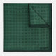 The Geometric Green Pocket Square in Silk by Turnbull & Asser UK features a sophisticated forest green hue with a geometric pattern of concentric squares and a visible Turnbull & Asser label in the corner.