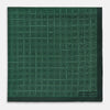 View 3 of product The Geometric Green Pocket Square in Silk by Turnbull & Asser UK features a sophisticated forest green hue with a geometric pattern of concentric squares and a visible Turnbull & Asser label in the corner.