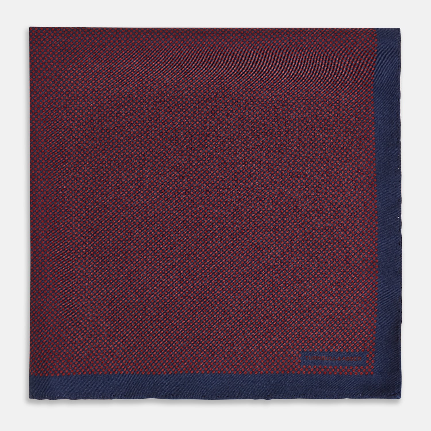 View 3 of product A Polka dot Burgundy Pocket Square in Silk by Turnbull & Asser UK, featuring a subtle micro motif and a solid navy border, partially folded at the top right corner.