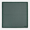 View 4 of product Turnbull & Asser UK Geometric Green Forest Green Pocket Square in Silk featuring a white geometric motif and a solid green border.