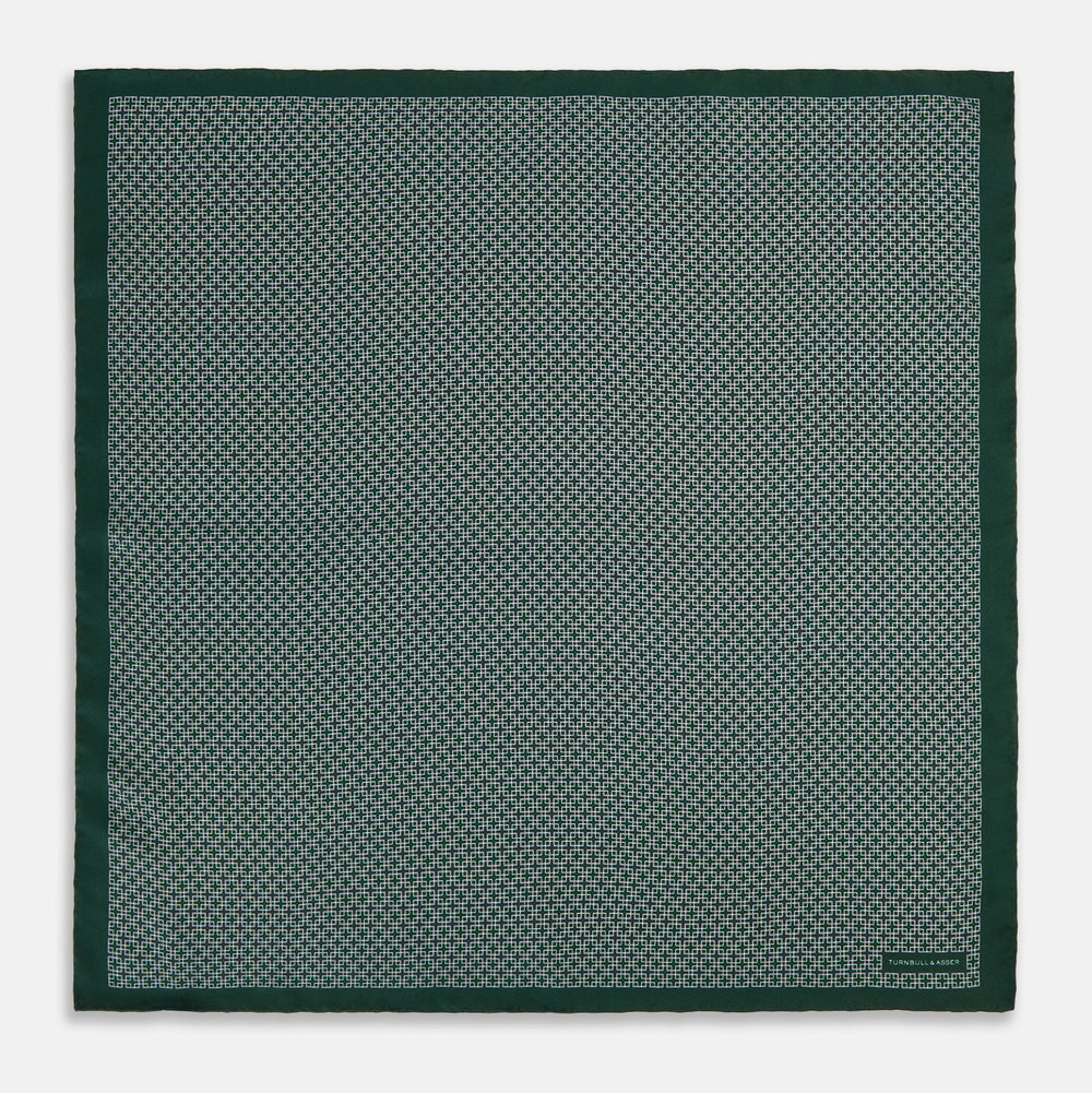 Turnbull & Asser UK Geometric Green Forest Green Pocket Square in Silk featuring a white geometric motif and a solid green border.