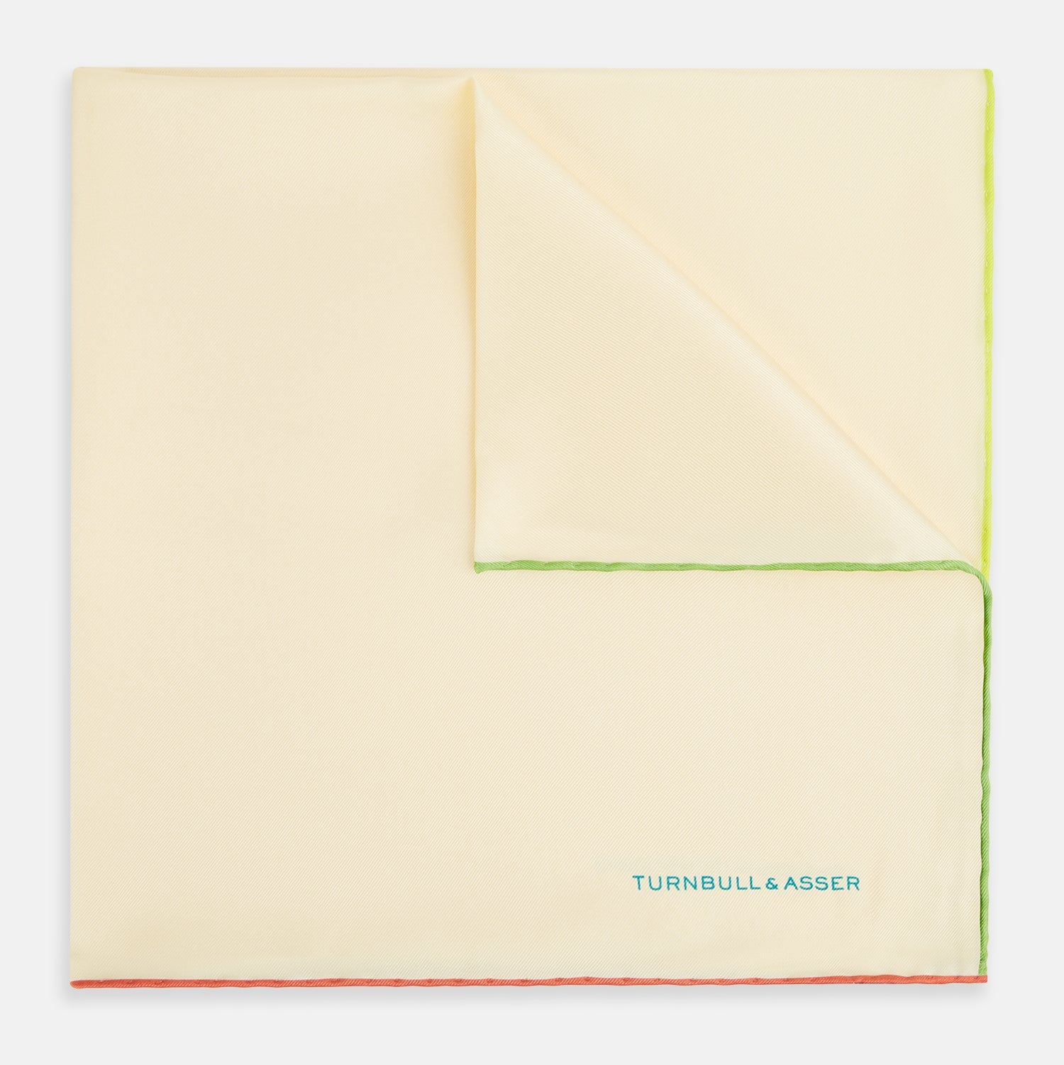 View 1 of product The Turnbull & Asser Ecru and Multicoloured Piped Silk Pocket Square features green and orange piping, blue "TURNBULL & ASSER" embroidery in the lower right, and a folded corner—a refined accessory for formal wear.