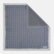 A square silk pocket square from Turnbull & Asser UK, featuring a subtle floral grey pattern; one corner is folded to reveal its double-sided design with a complementary pattern on the reverse side.