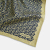 View 2 of product Introducing the Floral Yellow Pocket Square in Silk by Turnbull & Asser UK—a sophisticated square accessory featuring a vibrant yellow border and a black-and-white geometric dot pattern. One corner is tastefully folded to reveal its double-sided design, showcasing a smaller, denser dot motif on the reverse. Perfect for adding a modern touch of flair to any outfit or setting.