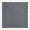 View 6 of product The Turnbull & Asser UK Geometric Yellow Tile Pocket Square in Silk features a sophisticated geometric square pattern in gold and navy, accented with subtle concentric squares and a discreet label stitched into the bottom right corner. Its double-sided design is highlighted by a folded corner that reveals a contrasting dotted navy and white underside.