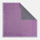 Certainly! Here’s a rewritten version of your sentence, incorporating the product data: The Geometric Lilac Tile Pocket Square in Silk by Turnbull & Asser UK features a lilac purple geometric pattern with a subtle square design, partially folded to reveal its double-sided construction with a contrasting black and white dotted pattern on the reverse.