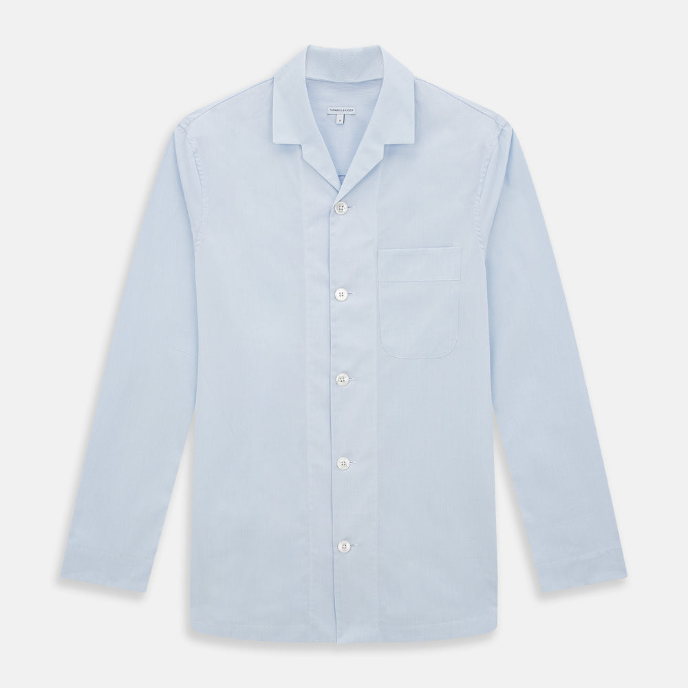 The Turnbull & Asser Pale Blue Fine Micro Check Pyjama Shirt features long sleeves, a notched collar, and a chest pocket—styled flat on white, ideal for elegant nightwear.
