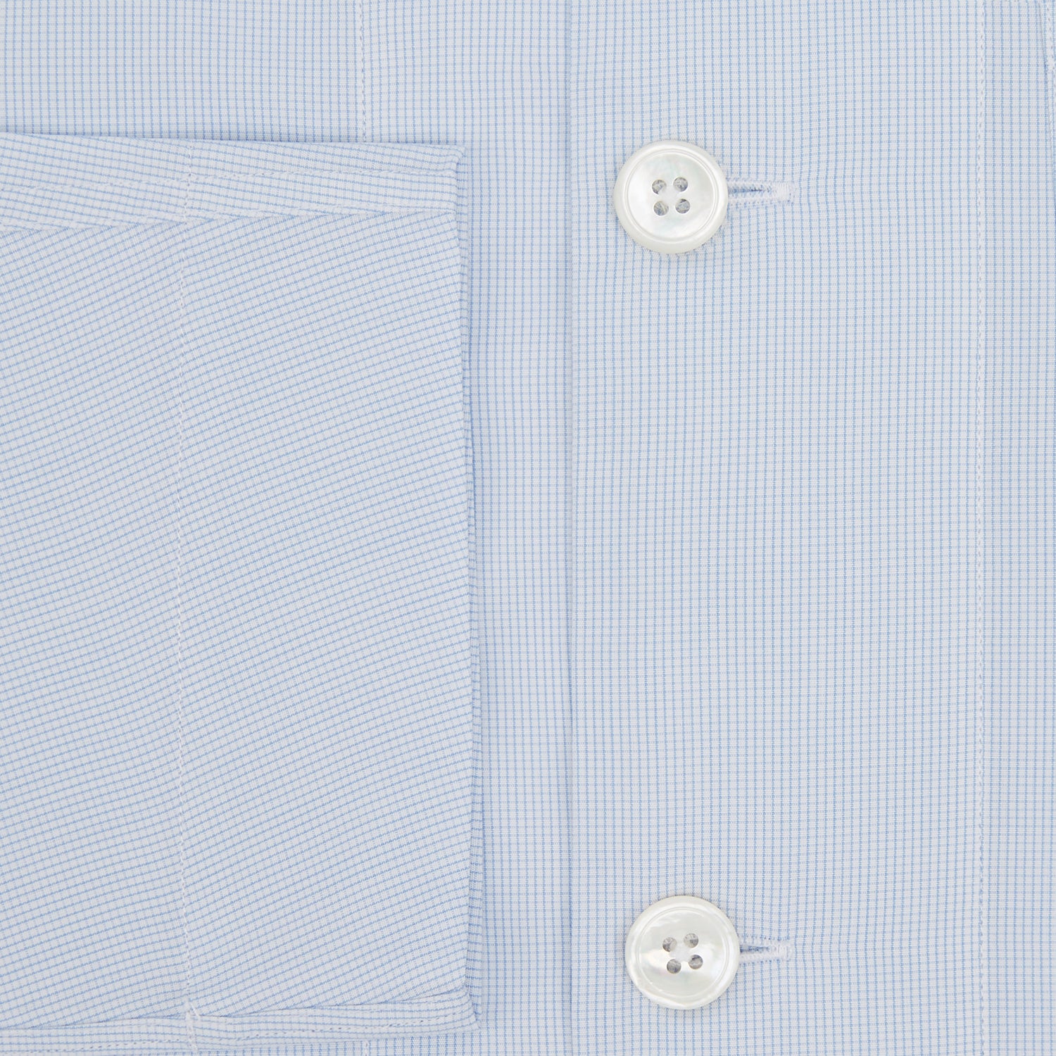 View 4 of product The Turnbull & Asser Pale Blue Fine Micro Check Pyjama Shirt features long sleeves, a notched collar, and a chest pocket—styled flat on white, ideal for elegant nightwear.