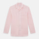 The Turnbull & Asser Pale Pink Linen Pyjama Shirt features long sleeves, a chest pocket, and a classic button-up design—ideal for stylish nightwear or relaxed homewear. Shown laid flat on a white background.