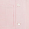 View 4 of product The Turnbull & Asser Pale Pink Linen Pyjama Shirt features long sleeves, a chest pocket, and a classic button-up design—ideal for stylish nightwear or relaxed homewear. Shown laid flat on a white background.