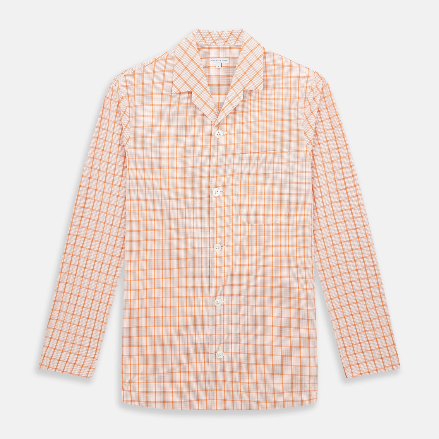 View 1 of product The Orange Graph Overlay Check Pyjama Shirt by Turnbull & Asser features long sleeves, a notched collar, and a front chest pocket, shown here laid flat on a white background.