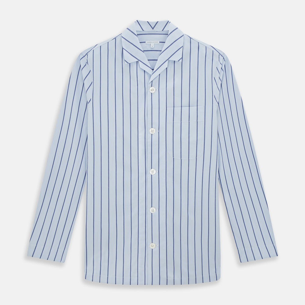 The Turnbull & Asser Blue Track Stripe Pyjama Shirt features a collar, white buttons, chest pocket, and vertical navy stripes—an elegant and comfortable loungewear option perfect for stylish nightwear.