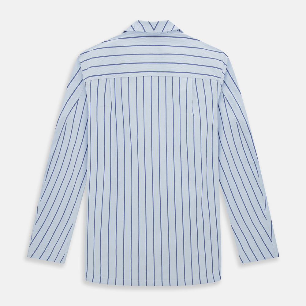 The Turnbull & Asser Blue Track Stripe Pyjama Shirt features a collar, white buttons, chest pocket, and vertical navy stripes—an elegant and comfortable loungewear option perfect for stylish nightwear.