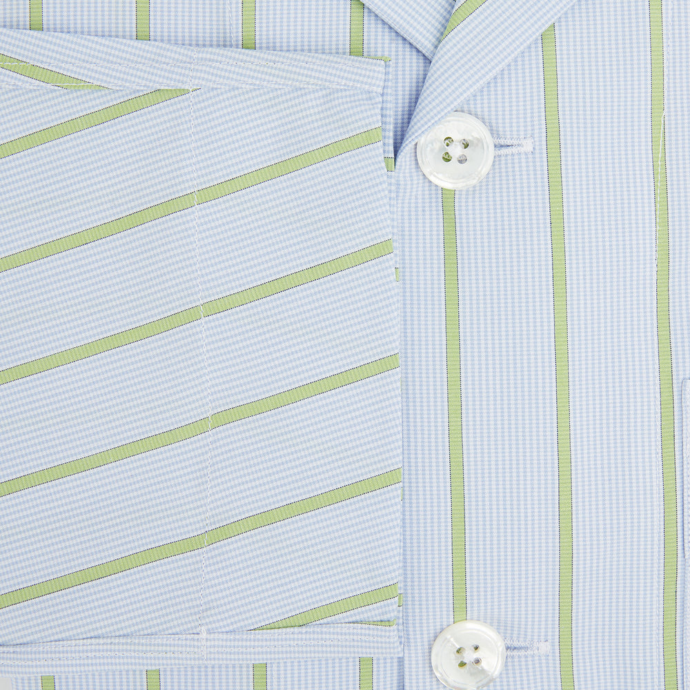 The Turnbull & Asser Light Green and Blue Stripe Pyjama Shirt features long sleeves, a front chest pocket, and elegant loungewear style, shown on a plain white background.
