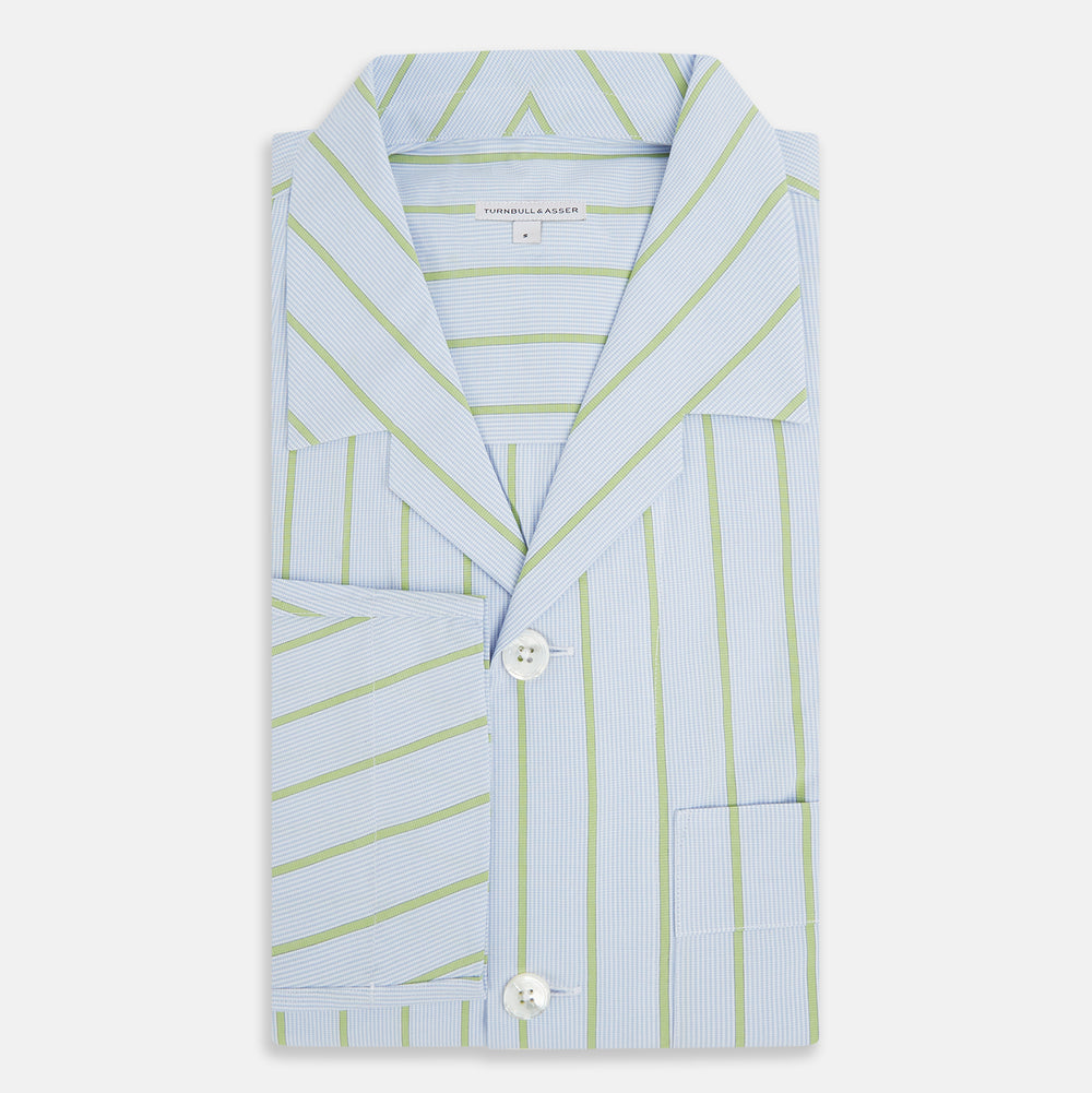 The Turnbull & Asser Light Green and Blue Stripe Pyjama Shirt features long sleeves, a front chest pocket, and elegant loungewear style, shown on a plain white background.