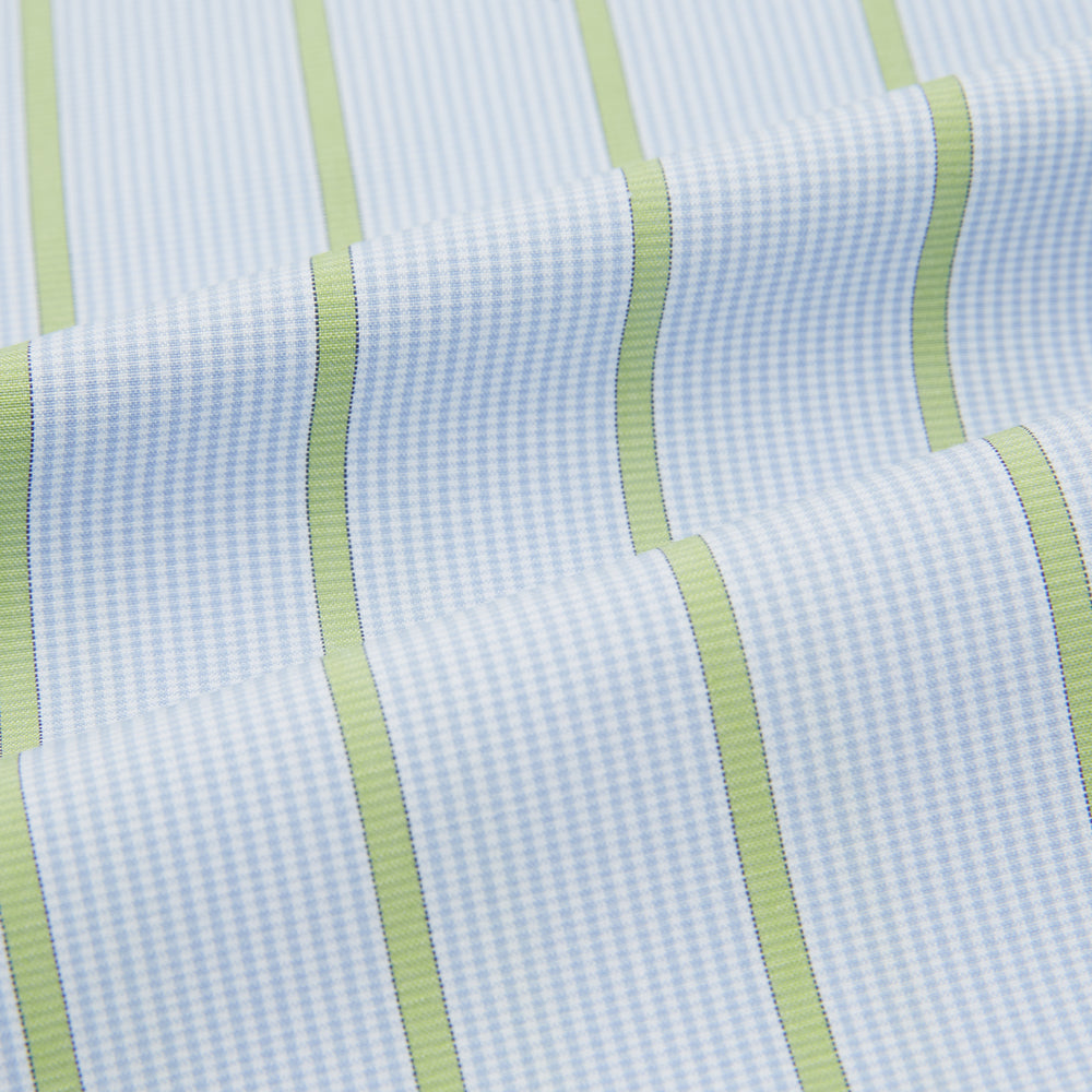 The Turnbull & Asser Light Green and Blue Stripe Pyjama Shirt features long sleeves, a front chest pocket, and elegant loungewear style, shown on a plain white background.