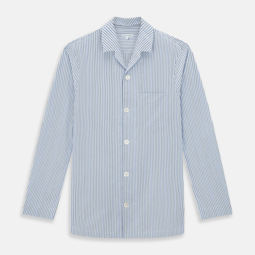 The Turnbull & Asser Blue Shadow Pinstripe Pyjama Shirt features blue and white vertical stripes, a chest pocket, and long sleeves—ideal for elegant homewear, shown against a white background.