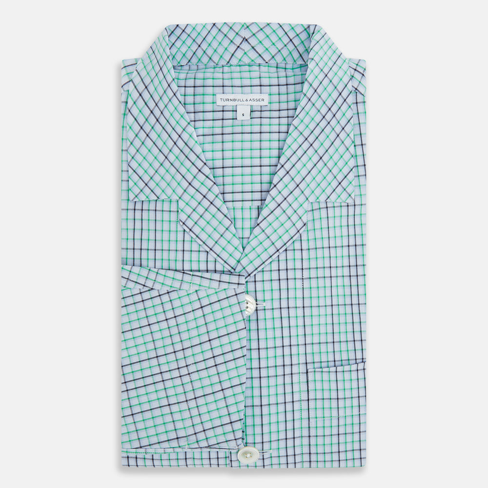 The Turnbull & Asser Green and Blue Shadow Check Pyjama Shirt, with a collar and chest pocket, is perfect loungewear or nightwear; shown laid flat on a white background.