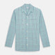 The Turnbull & Asser Green and Blue Shadow Check Pyjama Shirt, with a collar and chest pocket, is perfect loungewear or nightwear; shown laid flat on a white background.