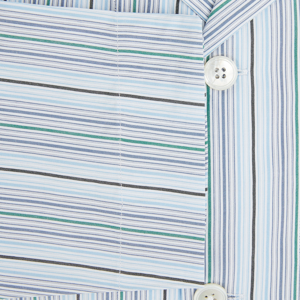 The Turnbull & Asser Blue and Green Multi Track Stripe Pyjama Shirt is a long-sleeve, button-up with collar and chest pocket, featuring blue and green stripes—ideal for stylish loungewear or nightwear.
