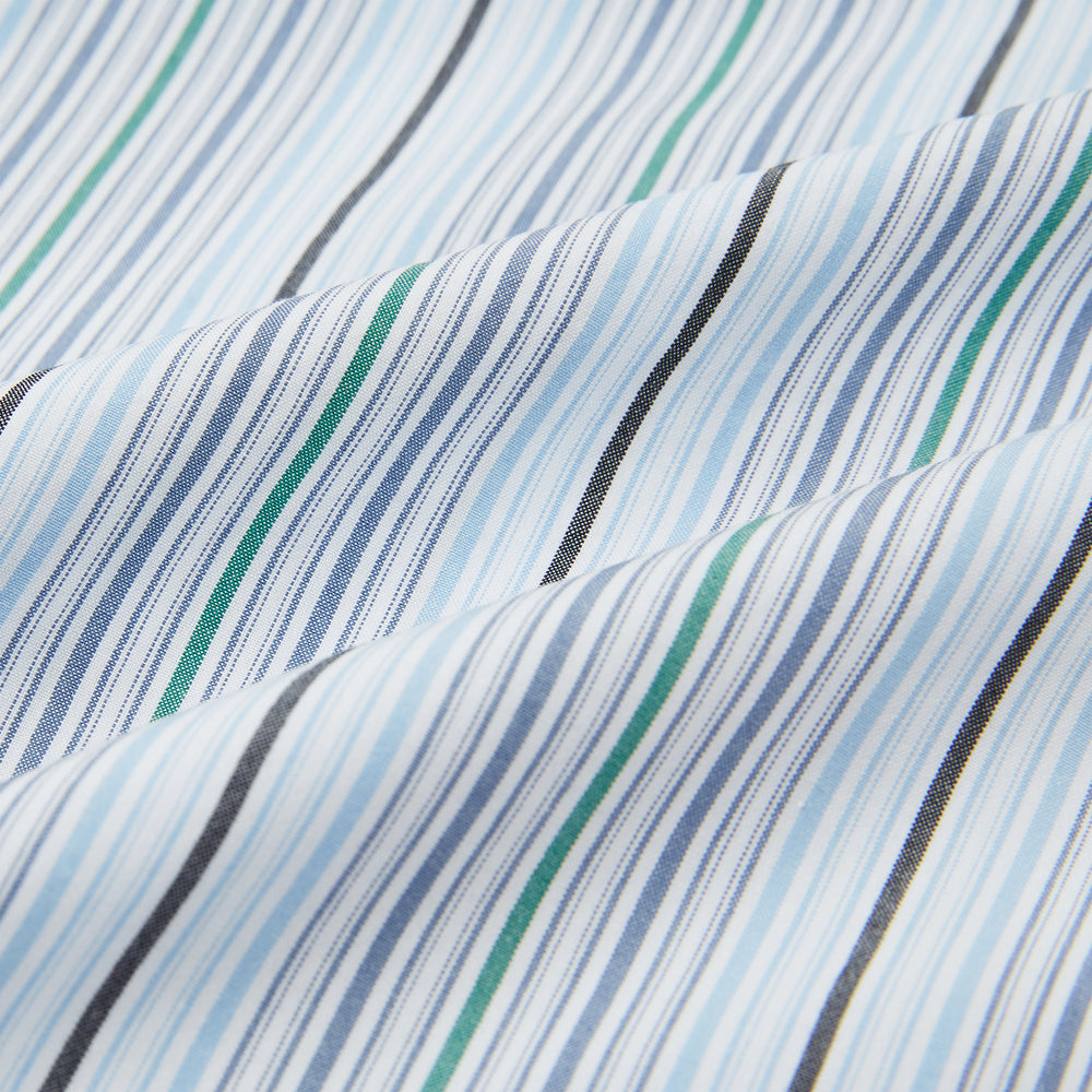 The Turnbull & Asser Blue and Green Multi Track Stripe Pyjama Shirt is a long-sleeve, button-up with collar and chest pocket, featuring blue and green stripes—ideal for stylish loungewear or nightwear.