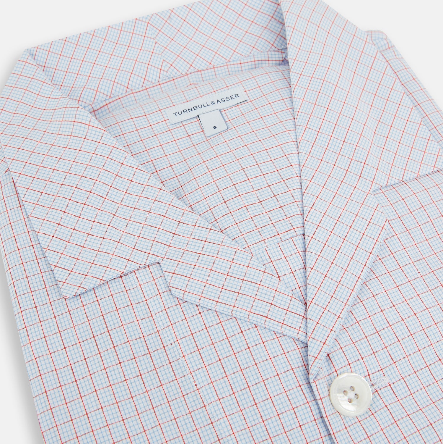 View 2 of product The Turnbull & Asser Red Multi Graph Check Pyjama Shirt is a stylish long-sleeved loungewear piece, ideal for comfortable and elegant nightwear.